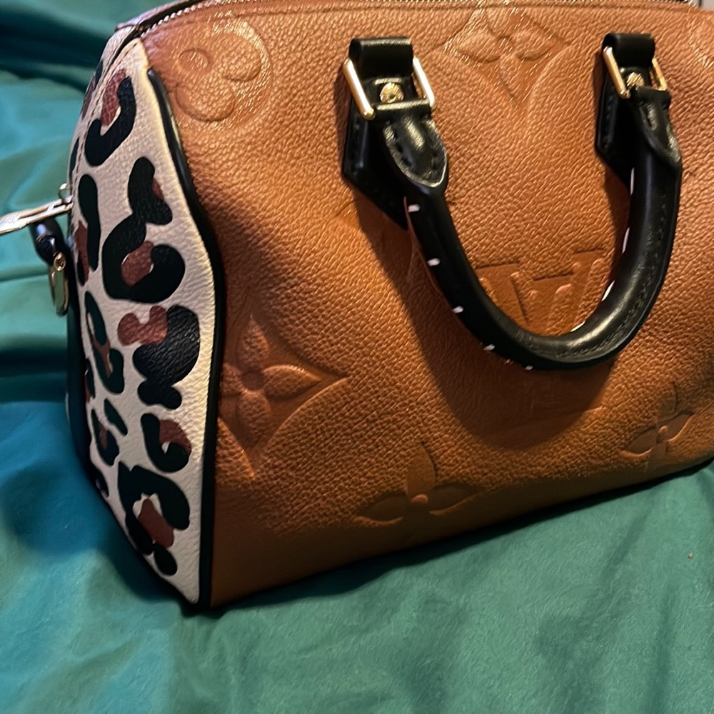 LOUIS VUITTON SPEEDY 25 BANDOULIERE WILD AT HEART MONOGRAM LEATHER